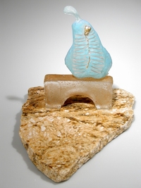 <div class='title'>Crossing to Safety</div><br>Kiln-cast glass, granite, gold leaf, prismacolor<br>10"h x 9"w x 11"d<br>