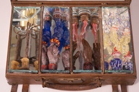 <div class='title'>Home Alone</div><br>Flameworked and cast glass pieces, glass beads, mirror, vintae leather box<br>12"h x 14"w x 12.5"d<br>