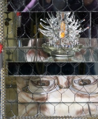 <div class='title'>Caged Bird</div><br>Flameworked vessel and eye, artist-painted enamel glass tile, sewing patterns, pen nibs, vintage buttons and bobbin, watch and jewelry parts, robin's egg, found objects<br>23"h x 11.5"w x 9"d<br>NFS